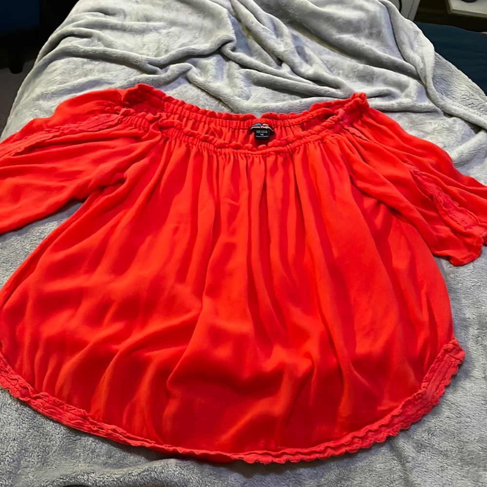 Dark orange blouse, cool material